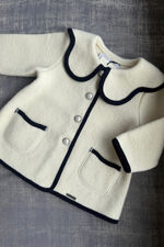 Marae ivory wool coat with navy trim