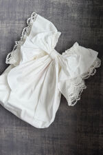 Phi ivory bow back romper 