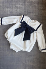 Be chic ivory velvet romper with navy bow