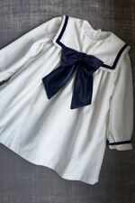 Be Chic ivory velvet dress with navy bow