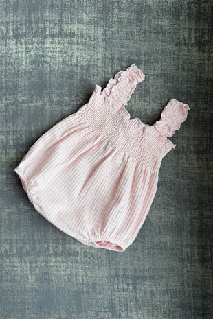 Calamaro pink bow romper