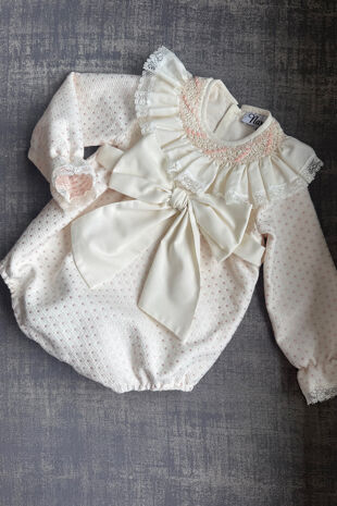 Naxos pink polka dot smocked collar romper