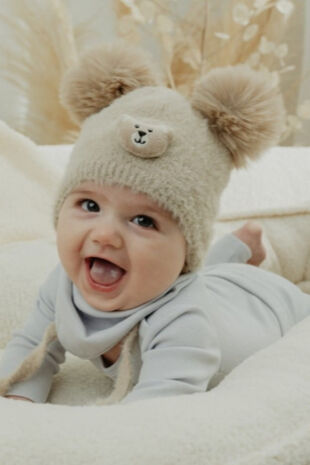 Jamiks beige bear pom pom hat