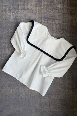 Be chic ivory blouse with black velvet trim