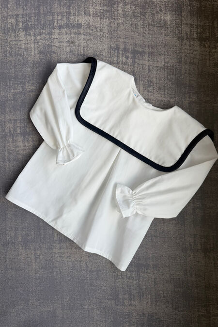 Be chic ivory blouse with black velvet trim