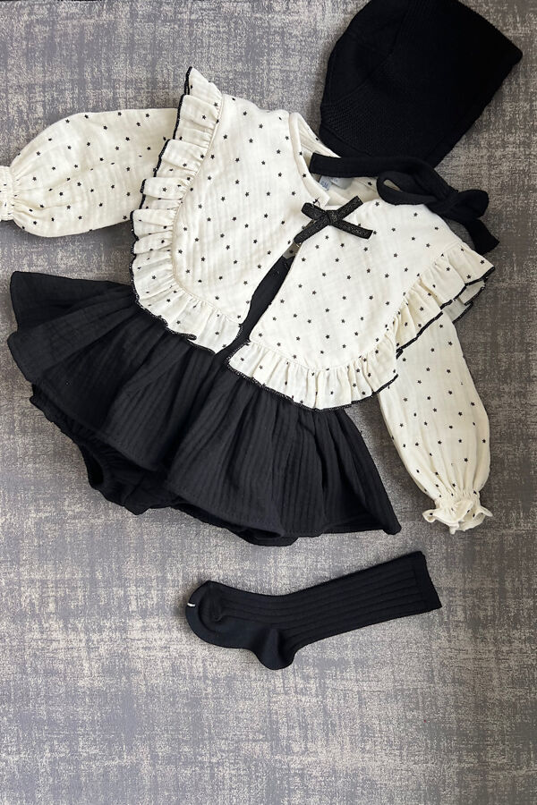 Jose Varon black romper and cream star print blouse set