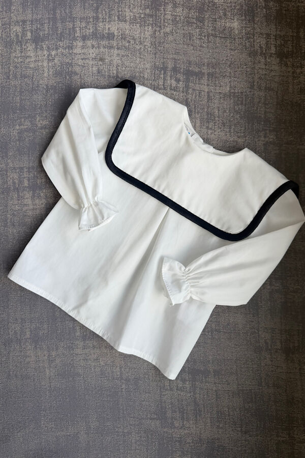 Be chic ivory blouse with black velvet trim