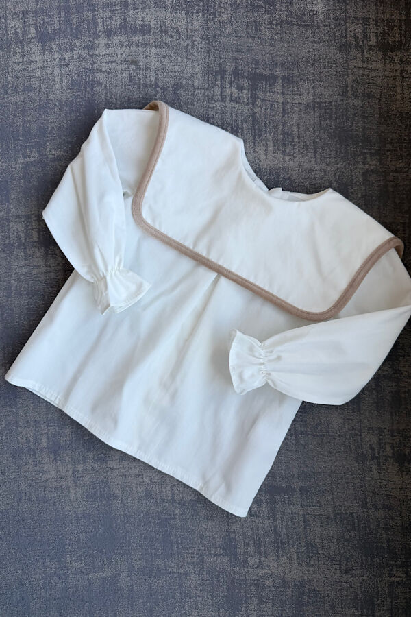 Be chic ivory blouse with beige velvet trim